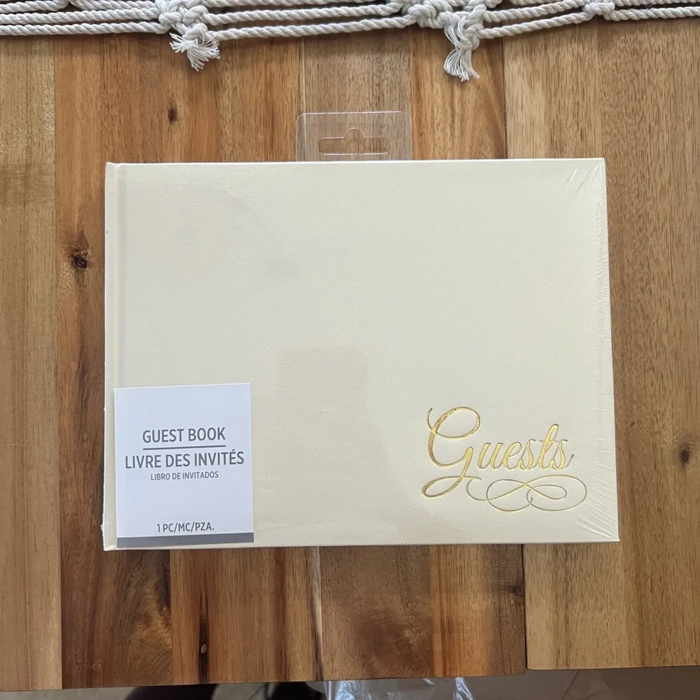 Cream and Gold Guest Book with Elegant Cursive Font